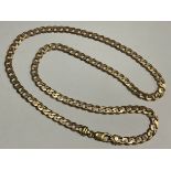 A 9ct gold curb link necklace, 25cm drop, the clasp marked 375, 23.6g