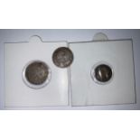 A Charles II Maundy coin 1679; two others smaller, 2p, 3p and 4p (3)