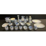 A quantity of Wedgwood blue jasperware including candlestick, jugs, vases, oval dishes, etc, qty