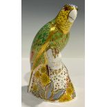 A Royal Crown Derby Bird paperweight, Amazon Green Parrot, limited edition 1,082/2,500, gold