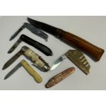 A Titanic penknife; an Opinel penknife; five others (7)