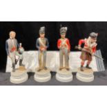 A set of four limited edition Coalport, porcelain military figures with including ‘Cameron