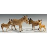 A Beswick donkey, ass and mule group; a Babycham fawn (4)