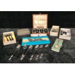 A silver cigarette box, various souvenir silver plated spoons and assorted flatware, qty