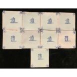 A collection of nine 18th century style Dutch blue and white delft tiles, 13cm square (9)