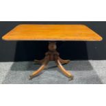 A Regency Revival mahogany rounded rectangular breakfast or centre table, 74cm high, 130.5cm long,