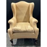 A 19th century wing arm chair