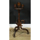 A 19th century oak smoking stand, circular plateau with turned vessels, turned column, downswept