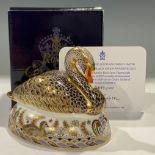 A Royal Crown Derby paperweight, Black Swan, specially commissioned by Royal Doulton to celebrate