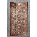 Carpets - a Woodward Grosvenor Persian Wilton reproduction rug or carpet, 183cm x 91cm