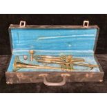 A Melody Maker brass trumpet, carry case