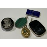A Victorian 'silver' cameo; two pendants; a Victorian locket; an Art Deco enamel buckle (5)