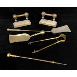 A harlequin suite of brass fireside tools, comprising poker, tongs, shovels and andirons (6)