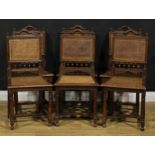 A set of six late 19th/early 20th century French oak dining chairs, 93.5cm high, 44.5cm wide, the