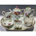 A Royal Copenhagen porcelain miniature part cabaret set on tray, comprising teapot, hot water jug,