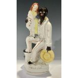 A 19th century Staffordshire flatback, Uncle Tom and Little Eva, 29cm