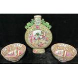 A large Chinese famille rose two handled moon flask, decorated in polychrome with courtyard scene,