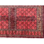 An Afghan Baluch type wool rug or carpet, 150cm x 93cm