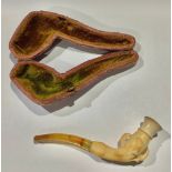 A meerschaum pipe, carved as a claw holding the bowl, cased