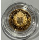 A gold half sovereign, 500th anniversary 1489 1989, capsulated, certificate, boxed.