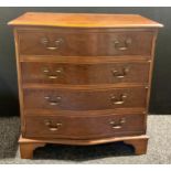 A George III style mahogany serpentine chest of drawers