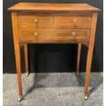 An Edwardian mahogany lowboy or side table, of three drawers, 75cm high, 60.5cm wide, 41cm deep