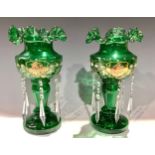 A pair of Victorian green glass lustres, enamelled and picked out in gilt, clear glass droplets,