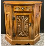 An Old Charm oak side cabinet, 81.5cm high, 77cm wide, 34.5cm deep