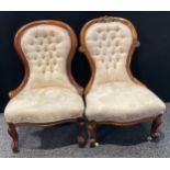 A Victorian walnut drawing room chair, 92cm high, 60cm wide, the seat 43cm deep; another, similar,
