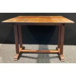 An early 20th century oak refectory dining table