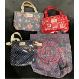 A Cath Kidston red polka dot hand bag, interior pocket, closing with a zip, 28cm wide; a Cath