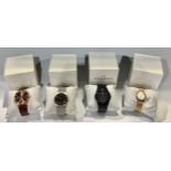 A gentleman's Skagen stainless steel fashion watch, boxed; three others, boxed; a lady's Skagen