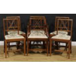 A set of six George III Revival mahogany dining chairs, comprising four side chairs and a pair of