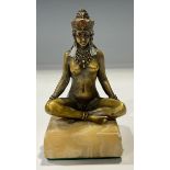 An Art Deco bronze, female nude seated cross legged, square marble base, 11cm high