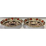 A pair of Royal Crown Derby 1128 Imari pattern oval dishes, 25.5cm long, first quality