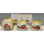 A Bradford Exchange Clarice Cliff Crocus pattern tea for two, teapot, pair of cups and saucers,