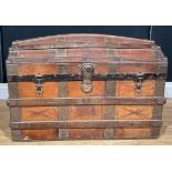 An American domed steamer trunk, by the Eagle Lock Company, Terryville, Connecticut, hinged top