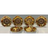 A set of six Royal Crown Derby 1128 Imari pattern petal trinket dishes, solid gold band, first