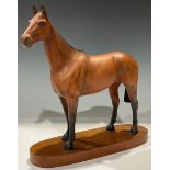 A Beswick model, of a horse, Arkle Champion Steeplechasser, mounted on wooden base, 30cm high