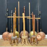 A collection of brass and copper warming pans; washing dollies (13)