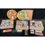 A collection of match boxes and match sleeves, promotional etc; a pair of 1950s school child