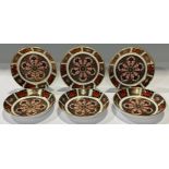 A set of six Royal Crown Derby 1128 Imari pattern circular trinket dishes, 10.5cm diameter, first