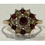 A 9ct gold dress ring, set red and white stones, size P