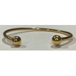 A 9ct gold bangle, 6.3g, boxed