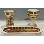 A Royal Crown Derby 1128 Imari pattern goblet, 12cm high, first quality; a similar hexagonal vase,