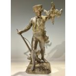A Victorian spelter figure, Young Sportsman, with rifle and game, 32cm high