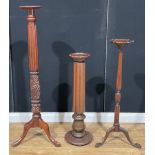 An early 20th century mahogany statuary pedestal or torchère, 138cm high; others, 106cm high, 92cm