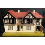 Toys & Juvenalia - a 1930's Tri-ang Toys dolls house with dolls house furniture (quantity)