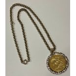 A Victorian gold five pound coin, 1887, mounted in 9ct gold as a pendant, suspended from a 9ct