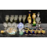 An Italian Murano glass gilt overlay blue glass decanter and six drinking tots; a Whitefriars